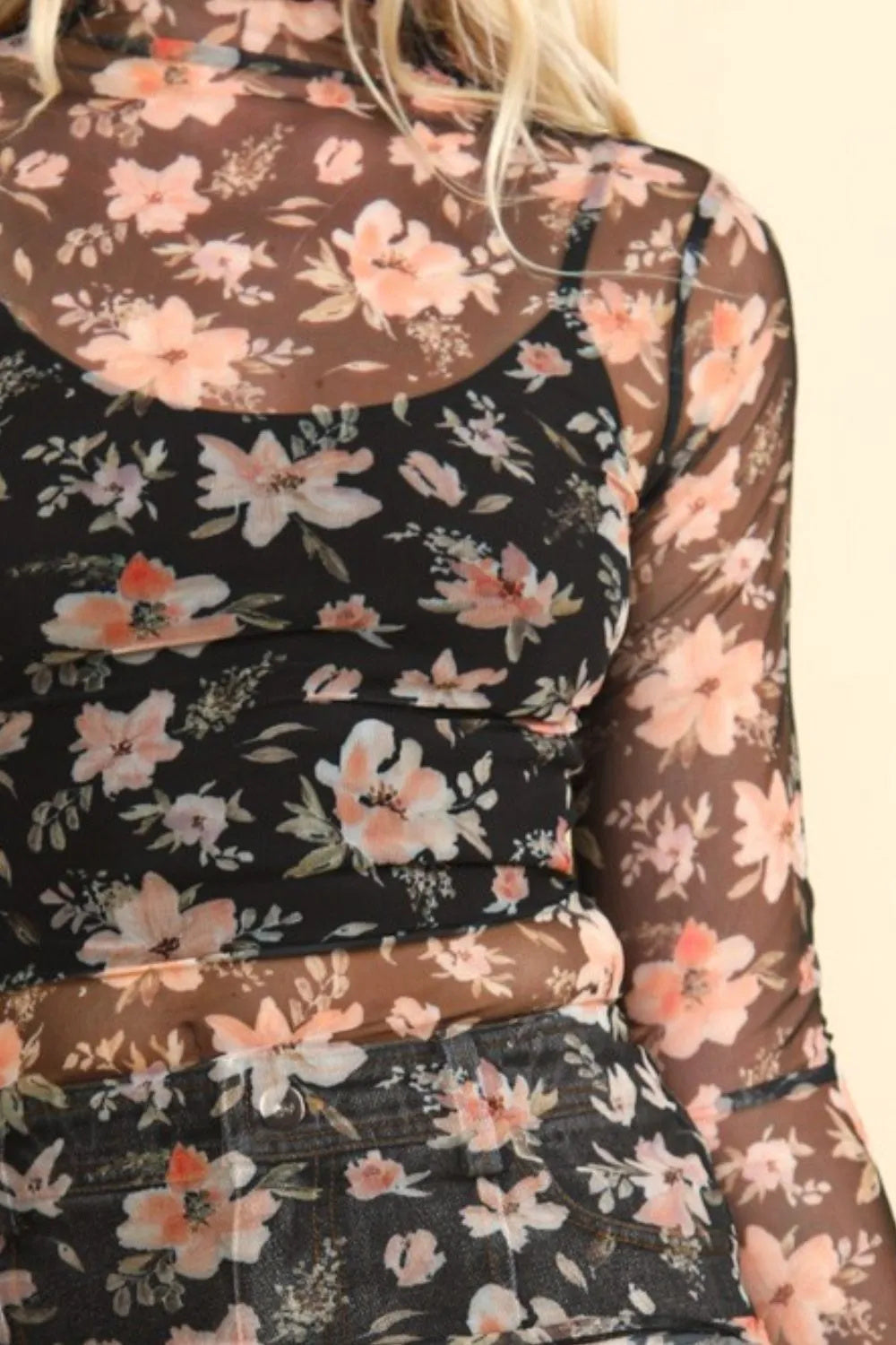 Blusa de malla transparente con cuello alto y estampado floral MUY J