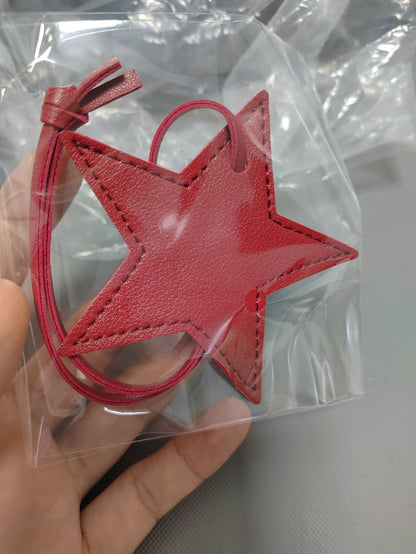 Llavero de cuero con forma de estrella de cinco puntas, colgante para bolso