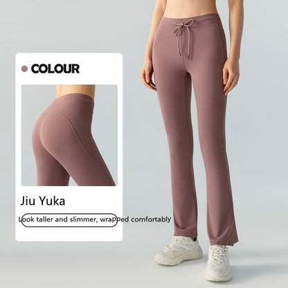 Pantalones de yoga casuales que adelgazan la cintura y levantan la cadera Pantalones de yoga con bolsillos bilaterales y cintura acampanada