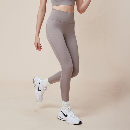 Pantalones de yoga deportivos de cintura alta color melocotón que mejoran la elevación de caderas y adelgazan la cintura