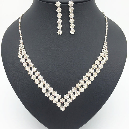 El collar de novia de exquisito lujo con doble diamante colgante y pendientes conjunto de accesorios para vestidos de novia coreanos collar femenino