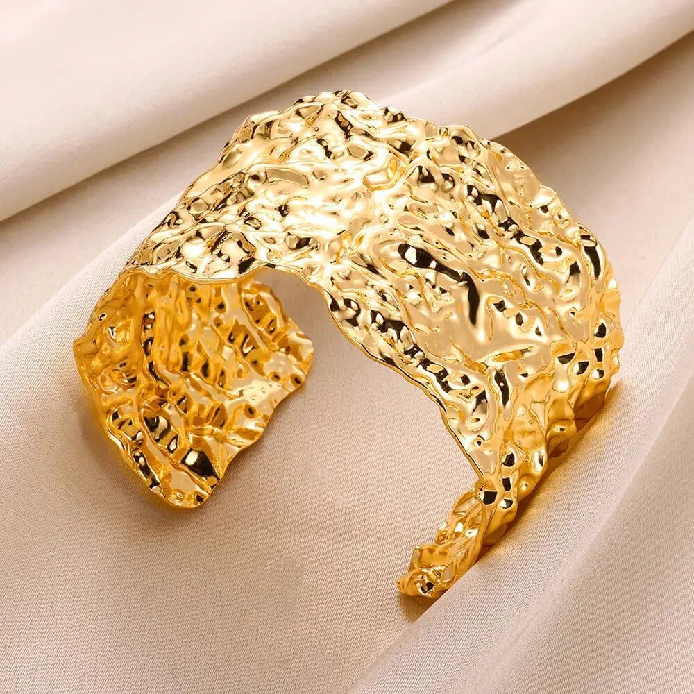 Pulsera de acero inoxidable dorado con patrón cóncavo-convexo