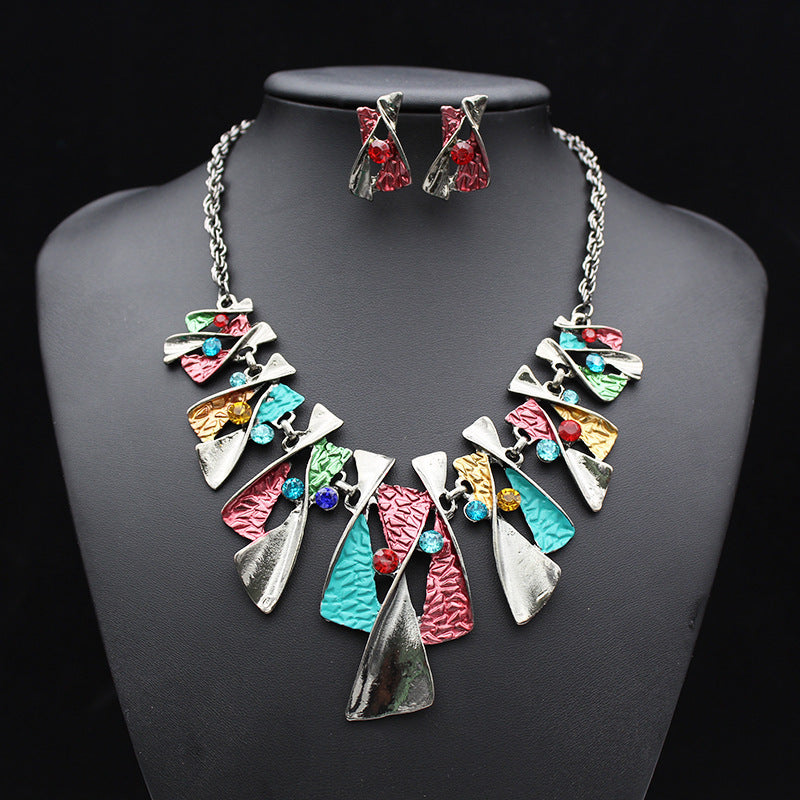 Conjunto de collar y pendientes de diamantes de aleación de colores de moda europea y americana, joyería de novia directa de fábrica