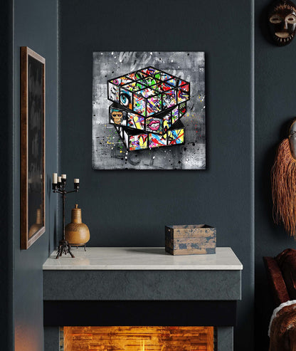 Pintura en lienzo con forma de cubo de Rubik y grafiti de Banksy