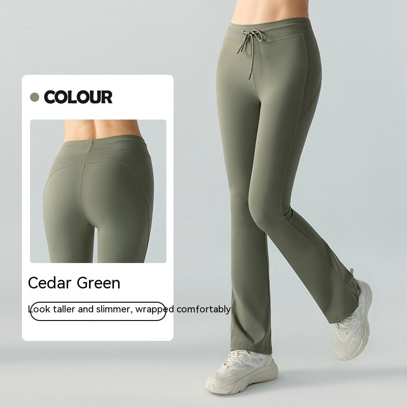 Pantalones de yoga casuales que adelgazan la cintura y levantan la cadera Pantalones de yoga con bolsillos bilaterales y cintura acampanada