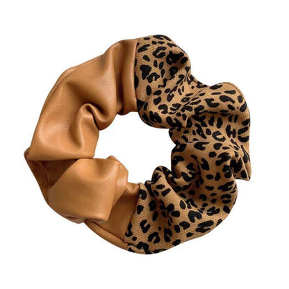 Anillo para el pelo del intestino grueso con nuevo diseño de leopardo y costuras de cuero en bloques de colores