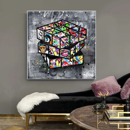 Pintura en lienzo con forma de cubo de Rubik y grafiti de Banksy