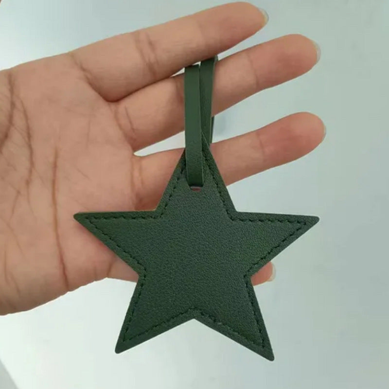 Llavero de cuero con forma de estrella de cinco puntas, colgante para bolso