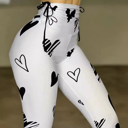 Leggings deportivos de yoga, hip-hop y fitness con estampado de corazones y cordón ajustable