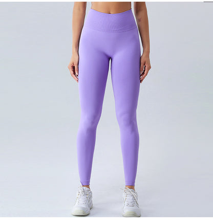 Pantalones de fitness para correr al aire libre para mujer, mallas deportivas sin costuras con realce de cadera en color melocotón