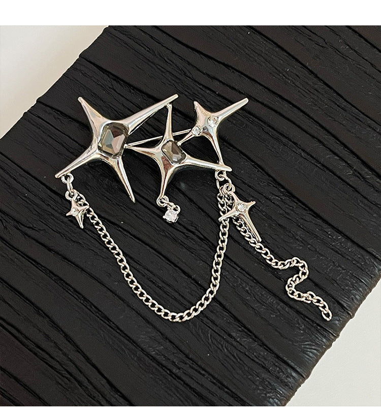 Broche de cadena de circonitas con cuatro estrellas de ocho puntas para mujer