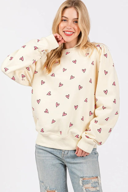 Sudadera de manga larga en contraste con estampado de corazón de SAGE FIG