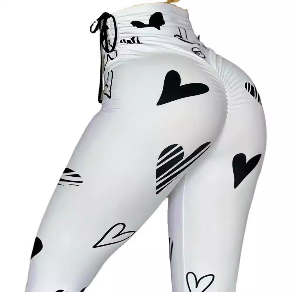 Leggings deportivos de yoga, hip-hop y fitness con estampado de corazones y cordón ajustable