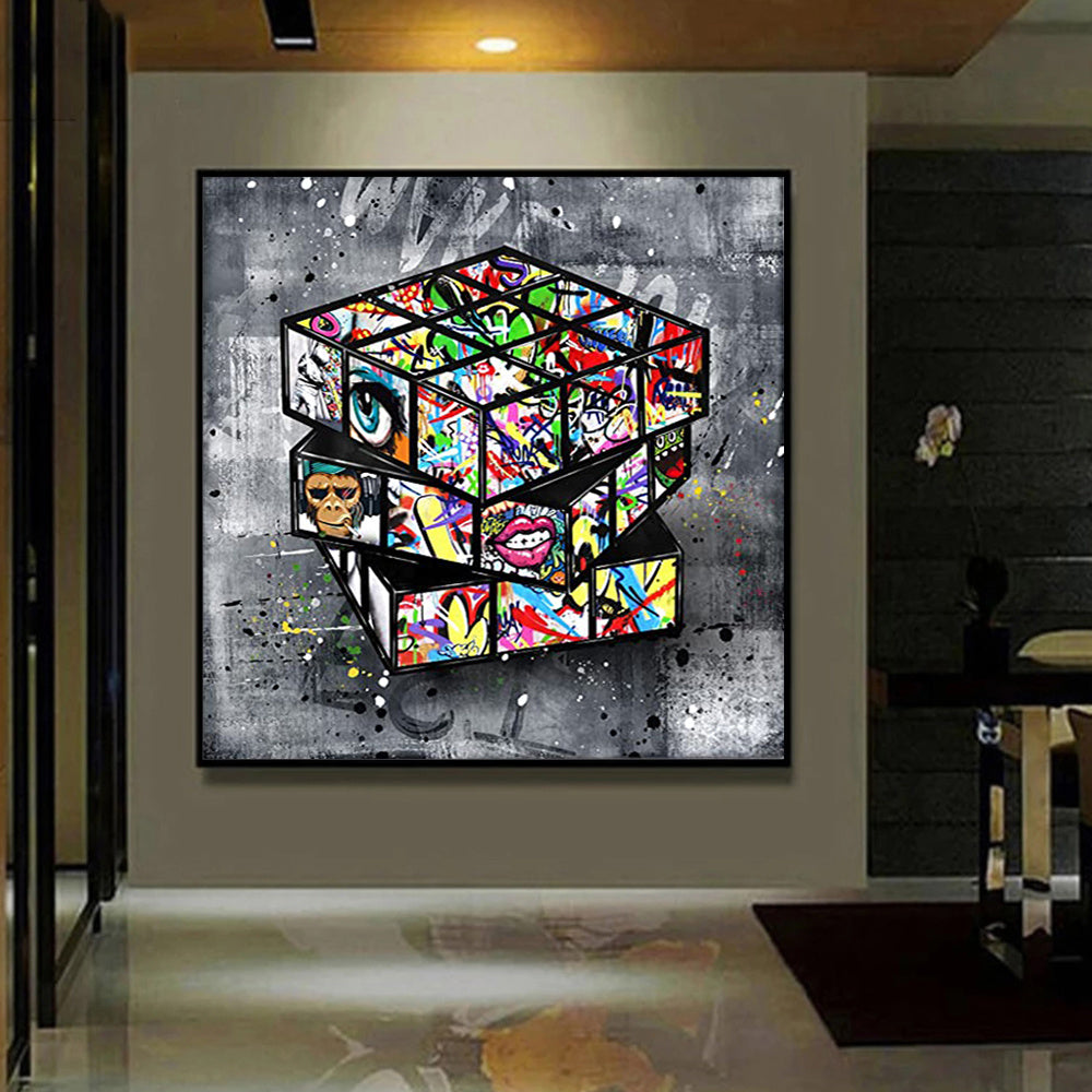 Pintura en lienzo con forma de cubo de Rubik y grafiti de Banksy