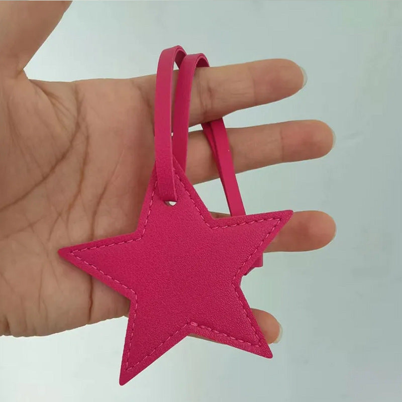 Llavero de cuero con forma de estrella de cinco puntas, colgante para bolso