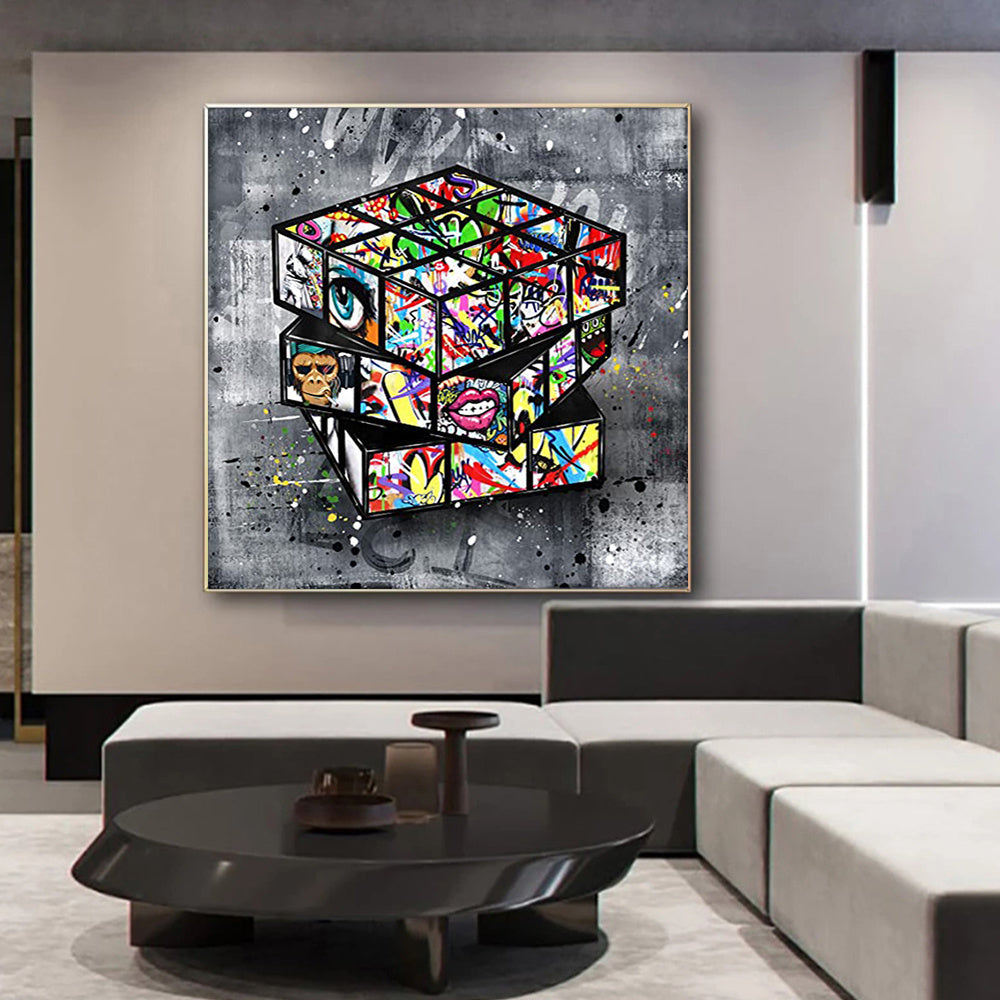 Pintura en lienzo con forma de cubo de Rubik y grafiti de Banksy