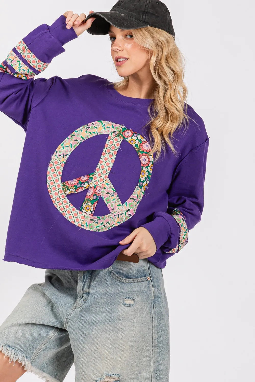 Blusa de manga larga con apliques de paz de SAGE FIG